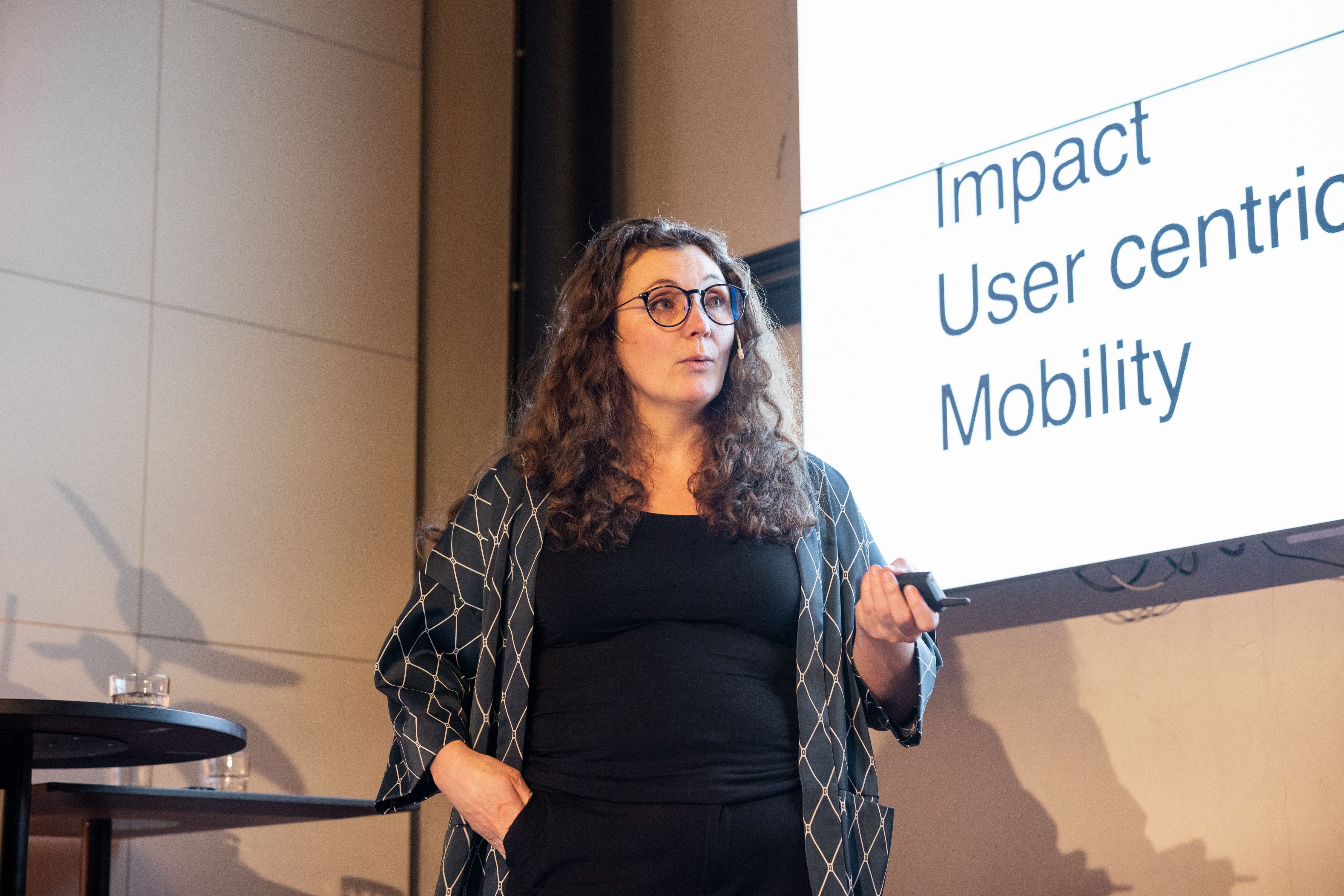 Kari Anne Solfjeld Eid of Whee! onstage at IxDA Oslo's meetup Nº 149, in the Atrium at MESH Youngstorget