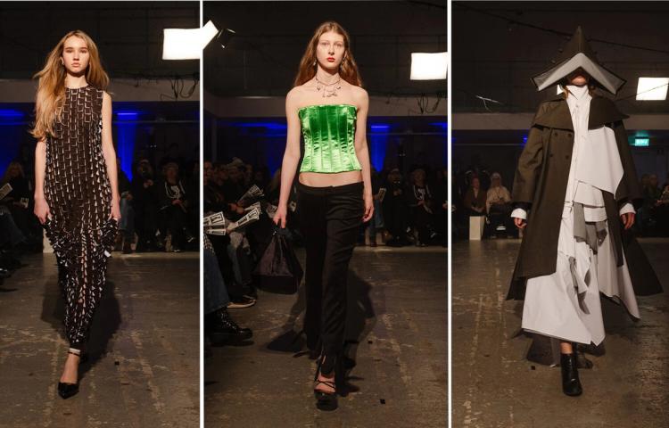 Tre modeller på catwalk: en i svart klänning med metallplattor, en i grön satinkorsett och svarta byxor, en i mörk kappa och stor spetsig hatt.