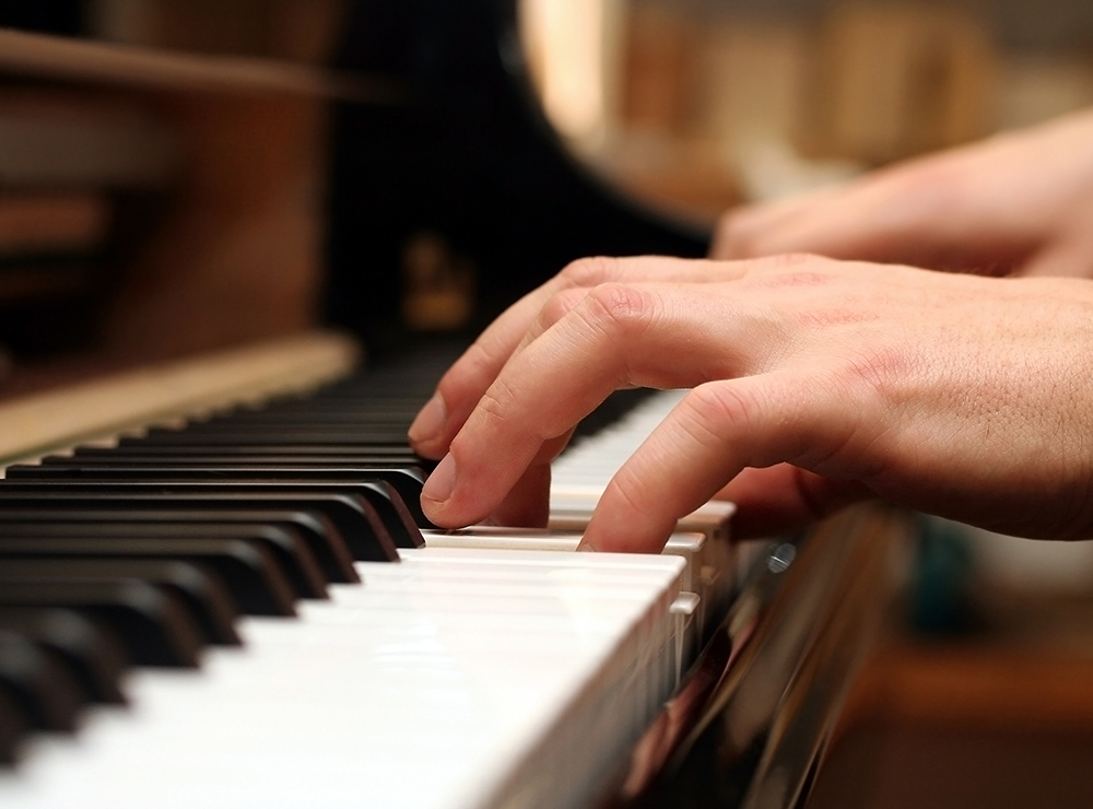 couple moving into new home with piano