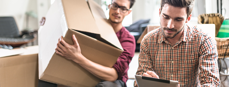 two men moving household goods