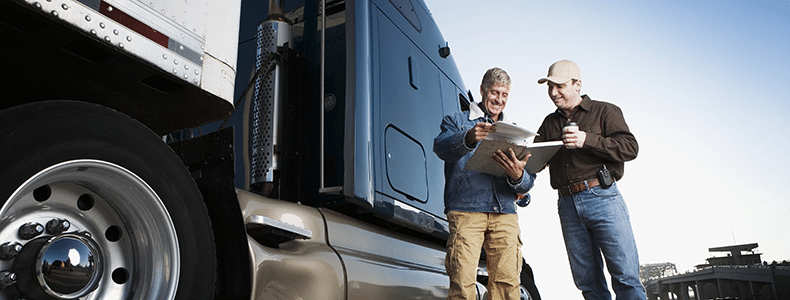 two men completing ltl shipping services