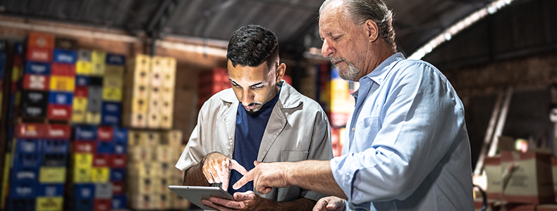 Two business shippers in warehouse
