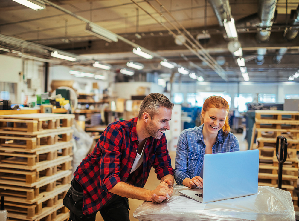 People receiving a LTL shipping rate in a warehouse