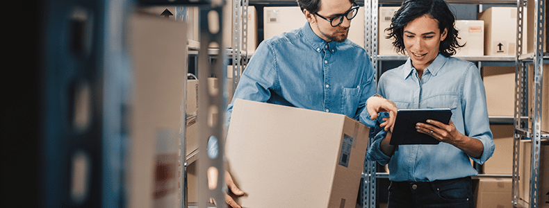 business shippers in warehouse looking for expedited shipping services