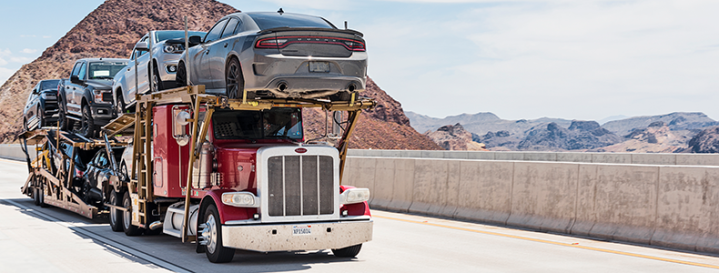 open car shipping truck example on road