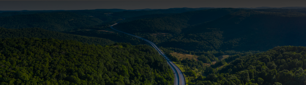 Aerial shot of an Arkansas highway in The Ozarks