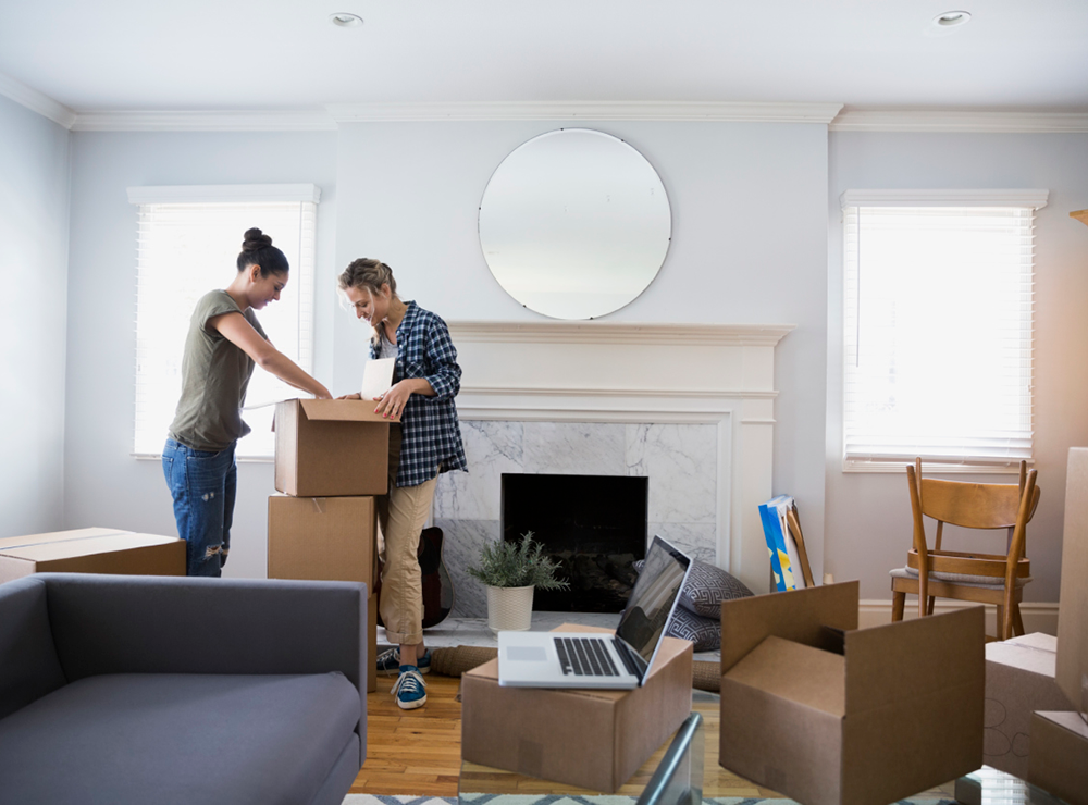 man carrying furniture