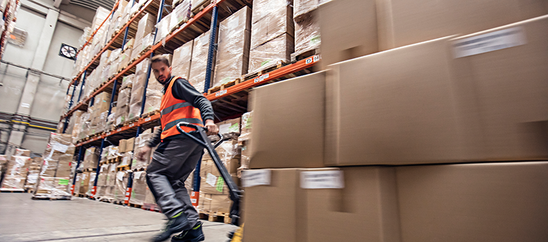 business shipper in warehouse with LTL freight