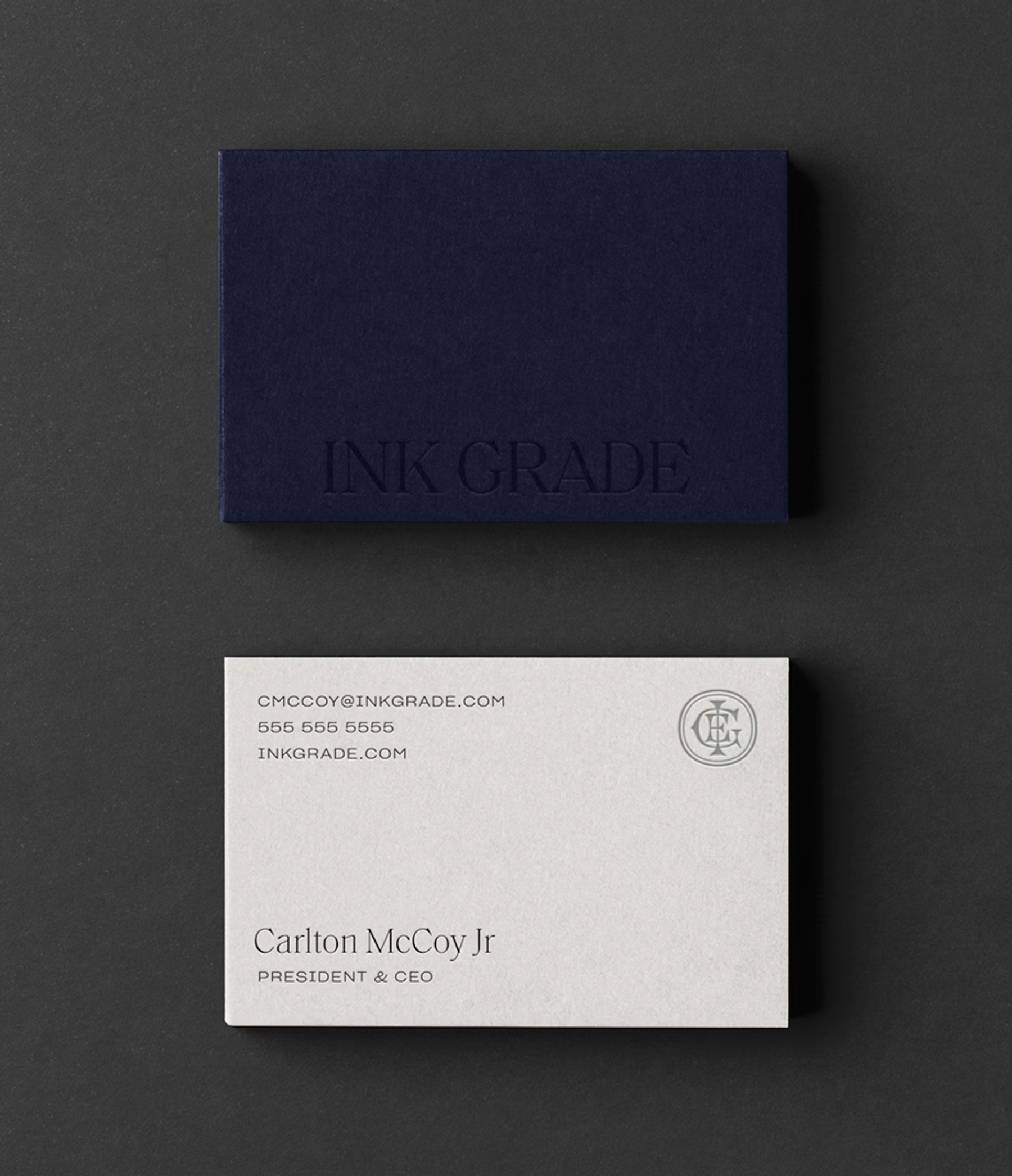 The brand system is anchored by a bespoke monogram and disciplined typography.