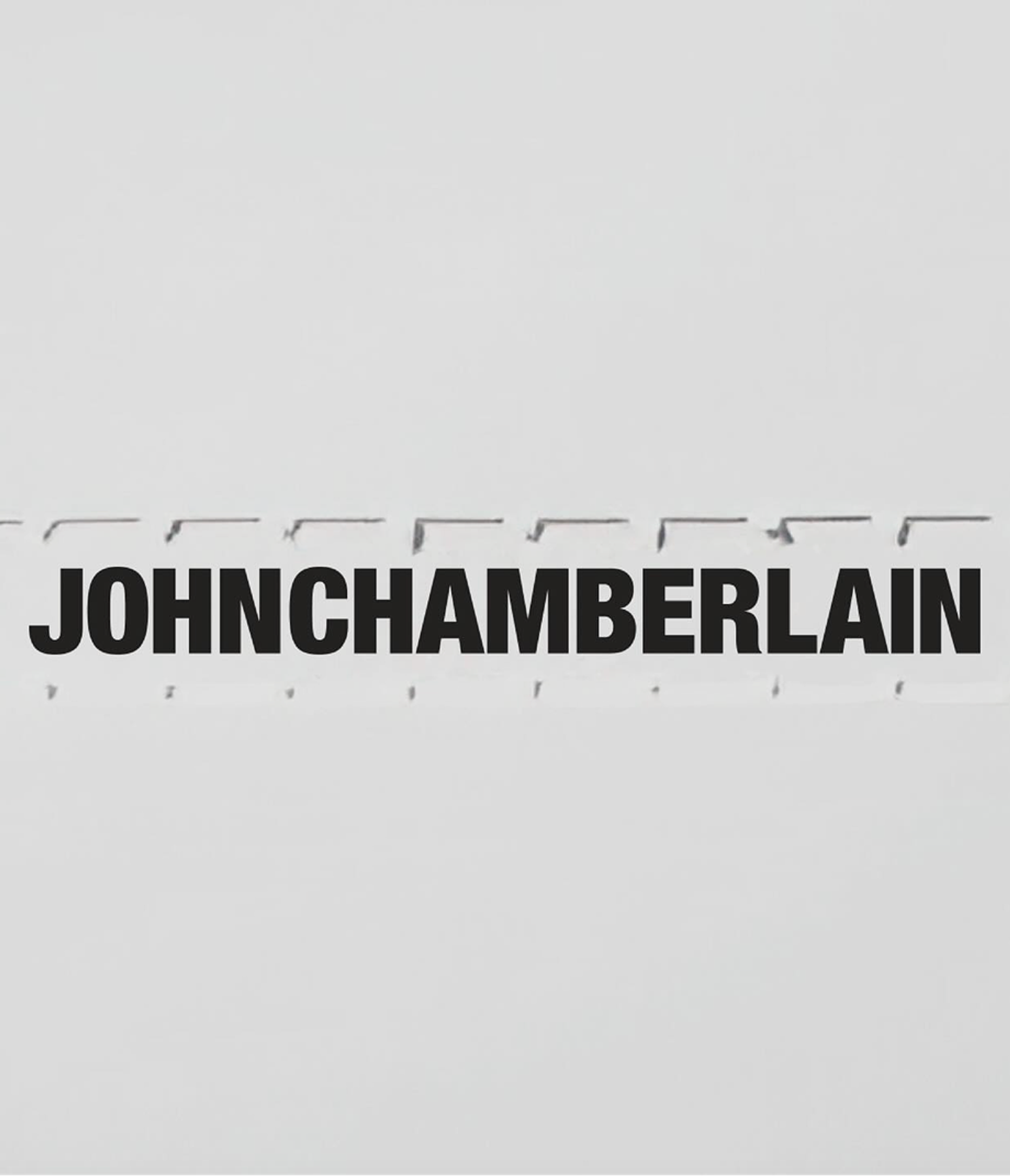 The JOHNCHAMBERLAIN identity is rooted in sculptural typography.