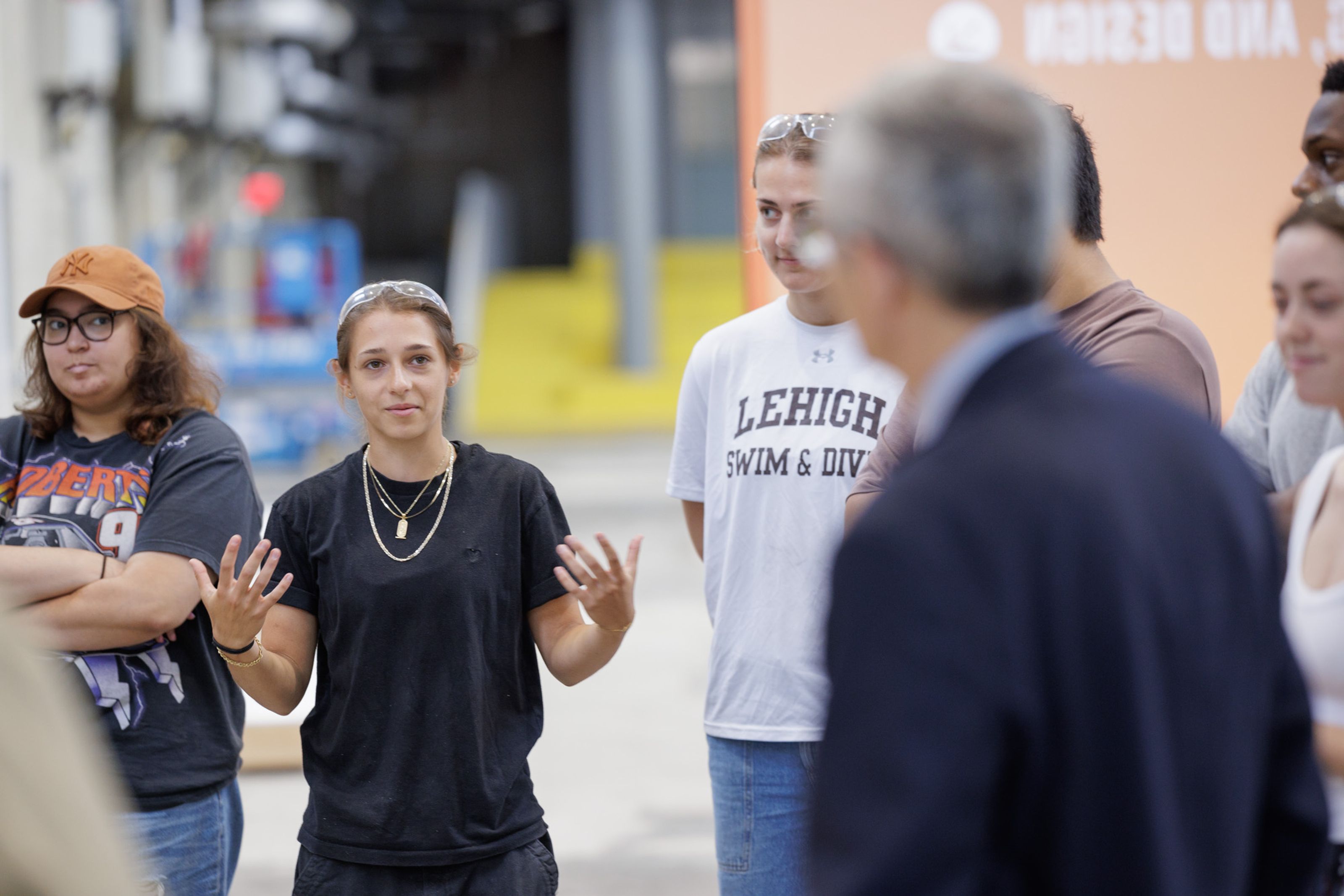 Jill Fournier, speaking to President Helble about her summer work in the Lab