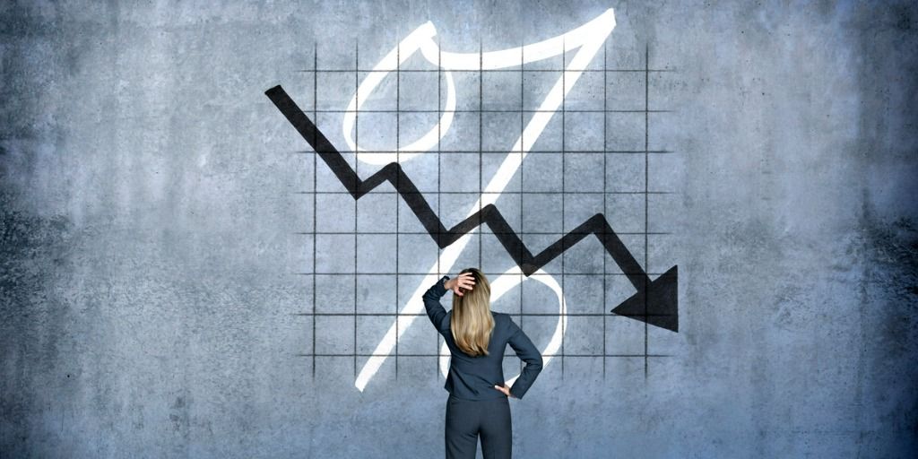 person looking at a declining economic situation