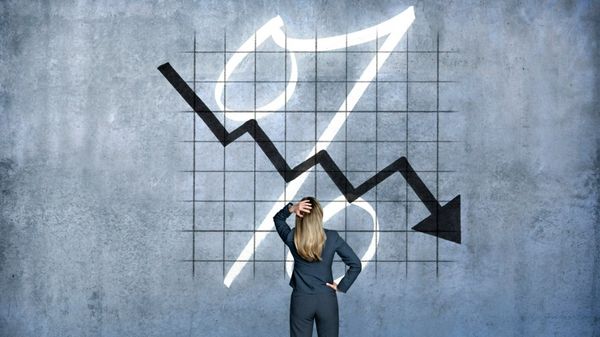 person looking at a declining economic situation