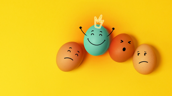 eggs with marker-drawn expressive faces