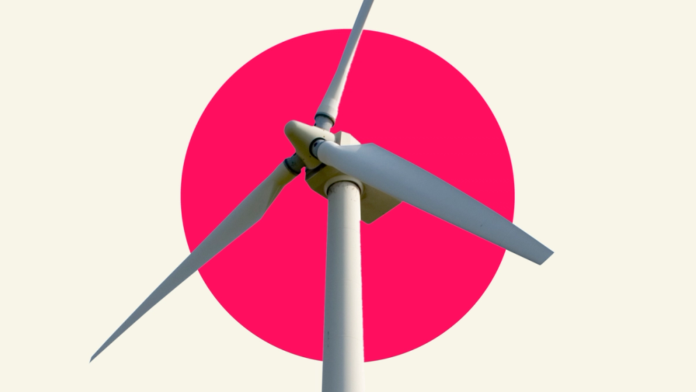 A wind turbine in a pink circle