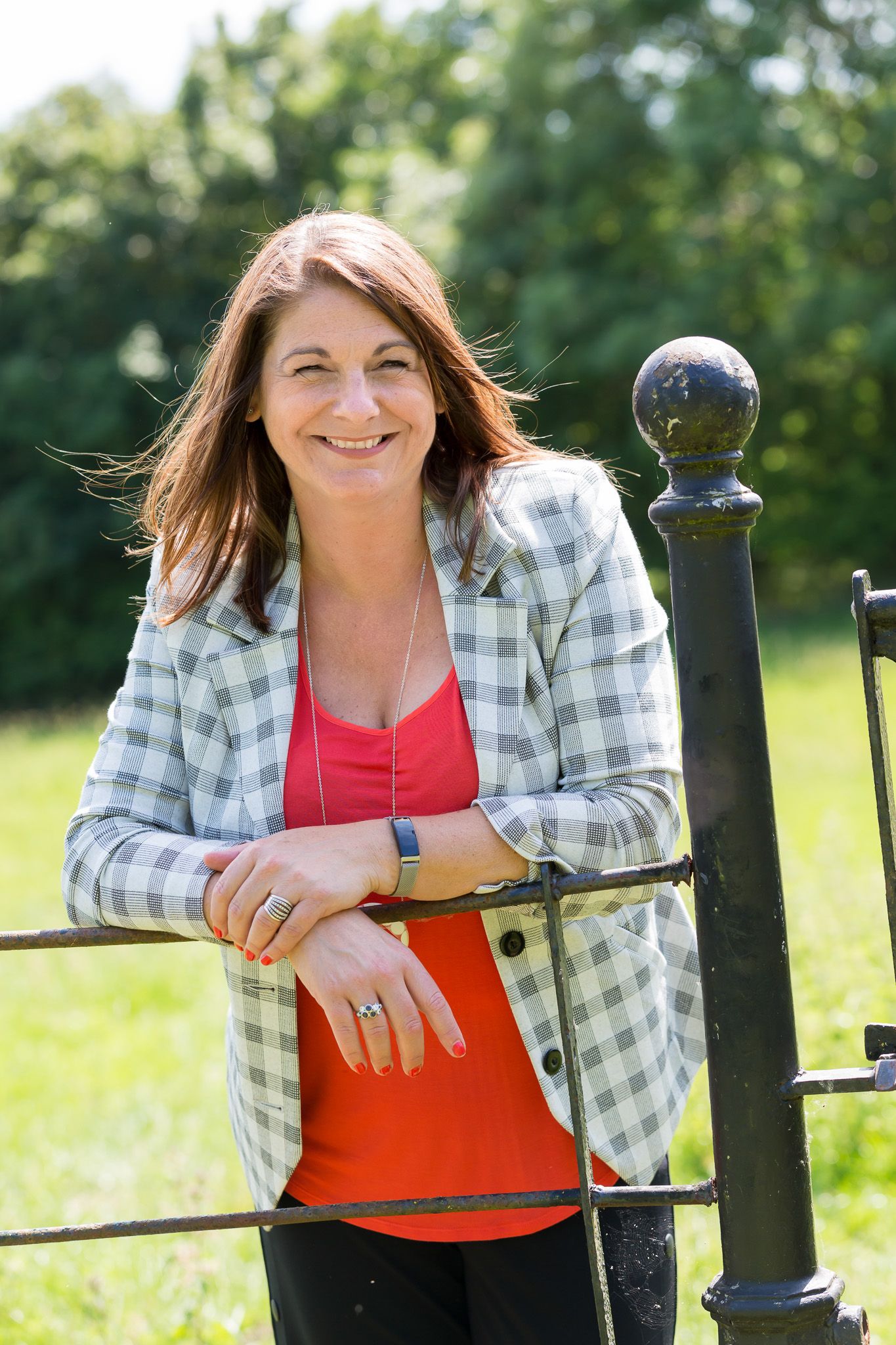 Photo of article writer Steph Smith smiling as she reflects on running her own business as well as looking after her family