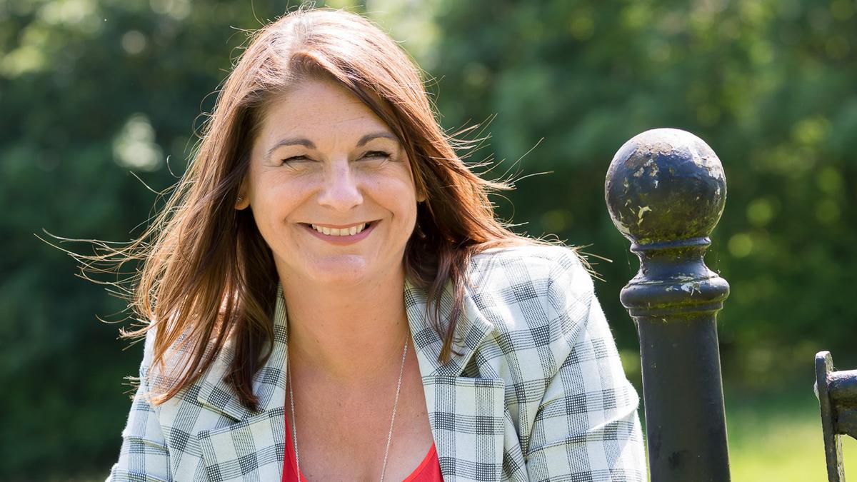 Photo of article writer Steph Smith smiling as she reflects on running her own business as well as looking after her family
