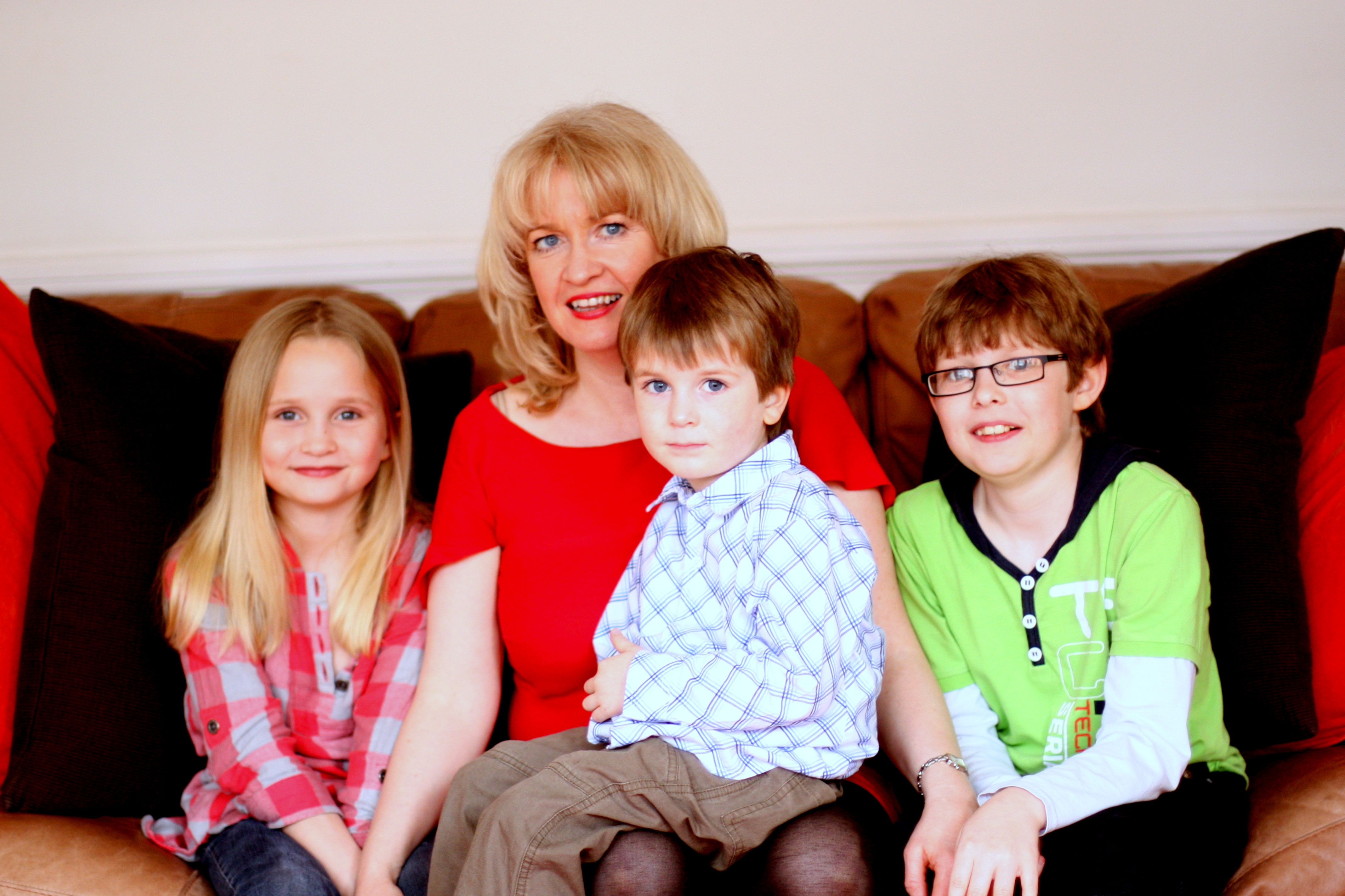 Article writer Helen Carroll pictured with her three children reflecting on parenting