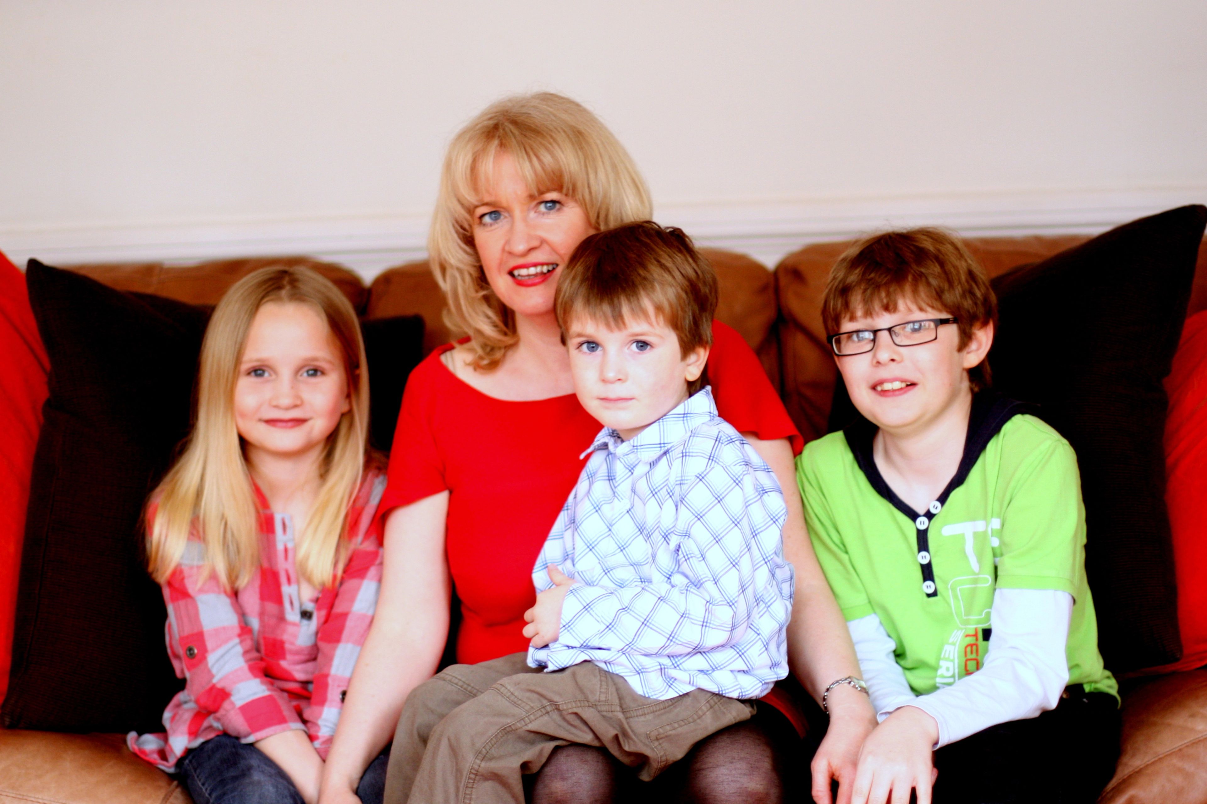 Article writer Helen Carroll with her three children reflecting on parenting