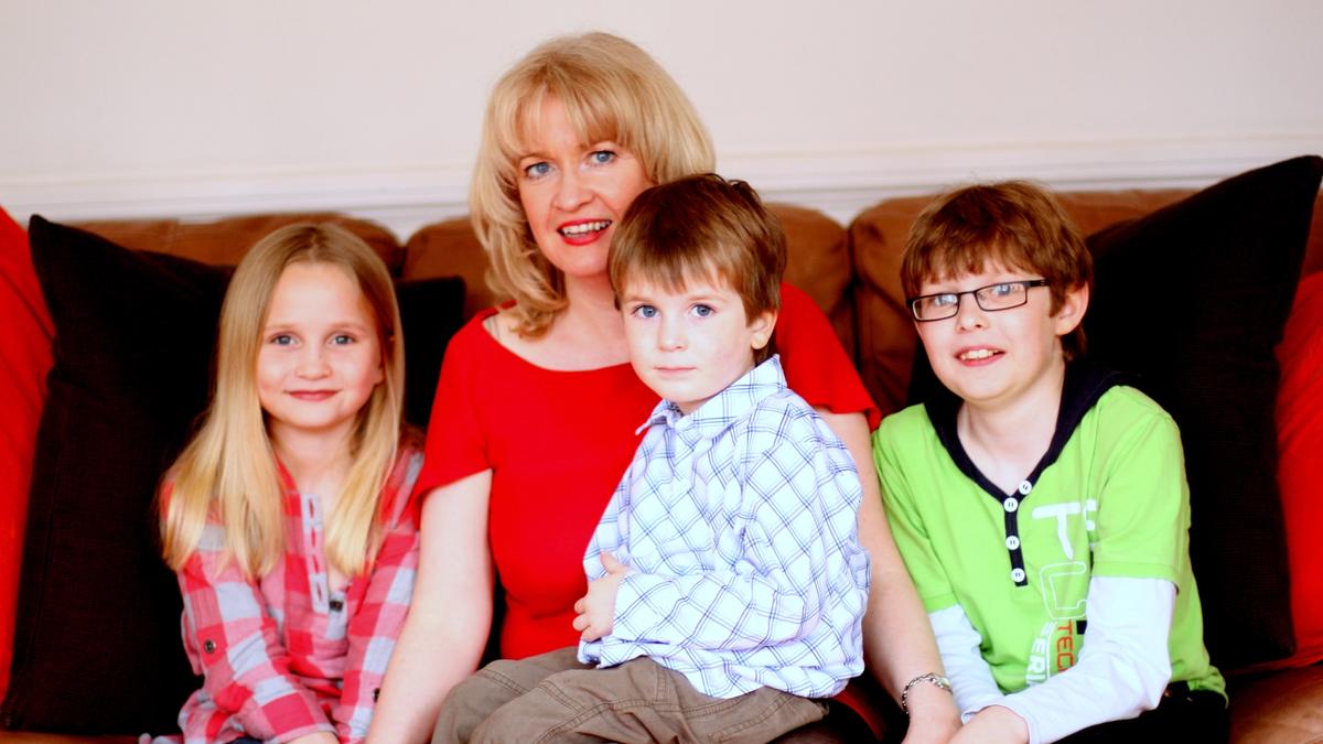 Article writer Helen Carroll pictured with her three children reflecting on parenting