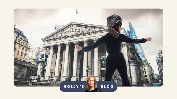 person with scary dinosaur head in front of the Bank of England
