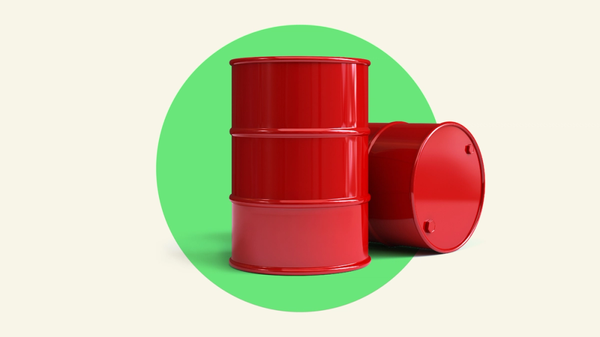 Two large fossil fuel oil barrels in a green circle