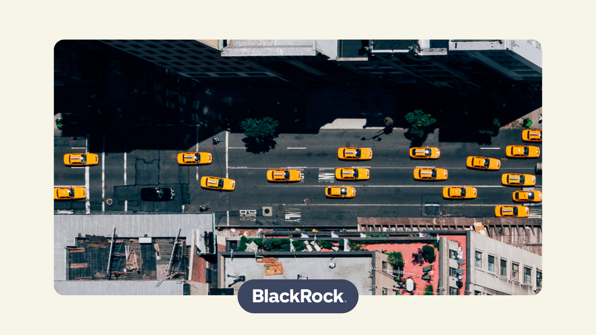 street view of yellow cabs and tall buildings