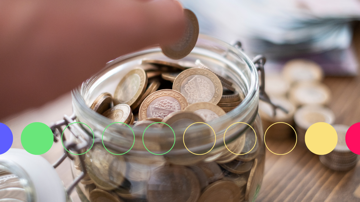 An image of a jar filled with pound coins