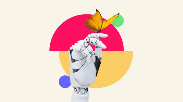 An image of a robot hand delicately holding a butterfly