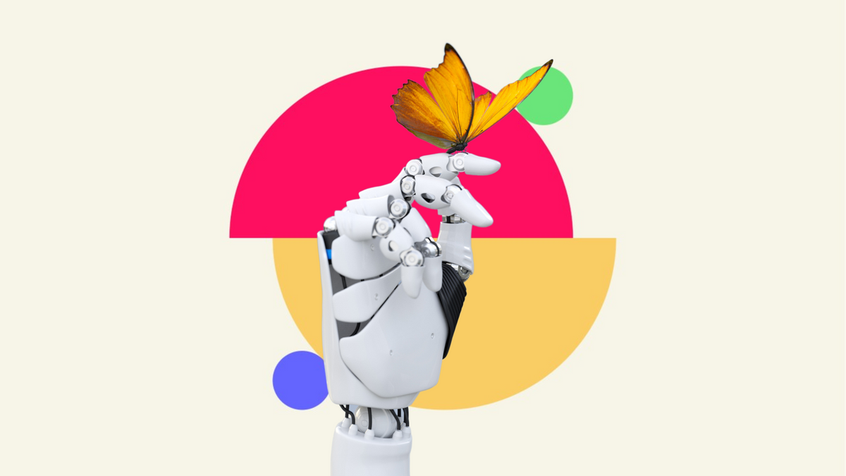 An image of a robot hand delicately holding a butterfly