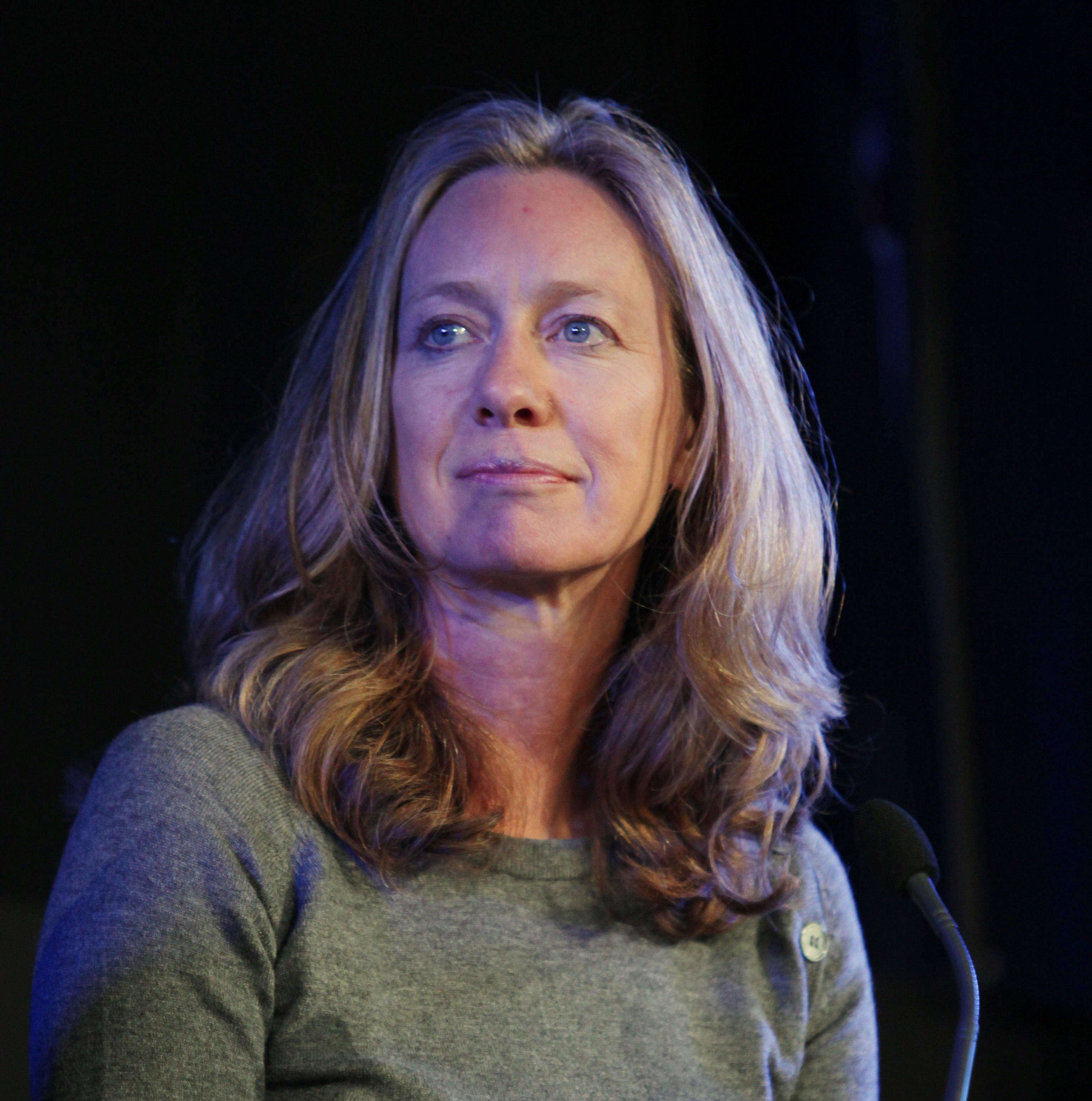 Photo of article writer Justine Roberts reflecting on being a mum