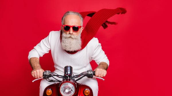 Cool older man riding a motorbike