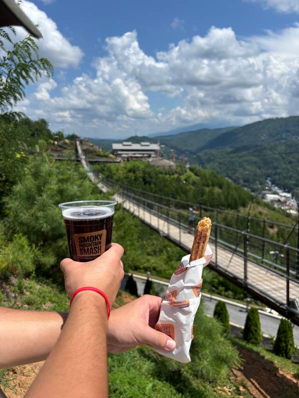 A churro and draft beer from Smoky Mountain Sips.