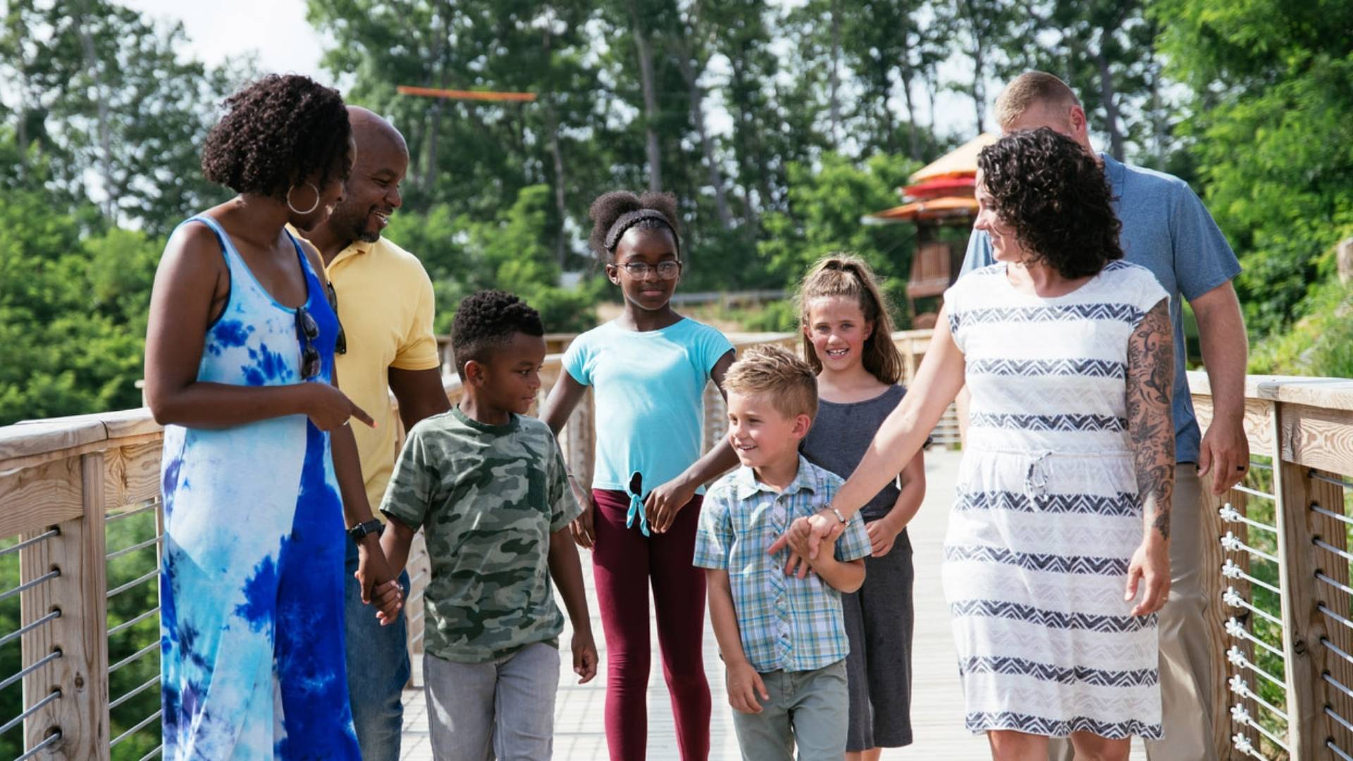 A family enjoying a walk on the SkyTrail Boardwalk.
