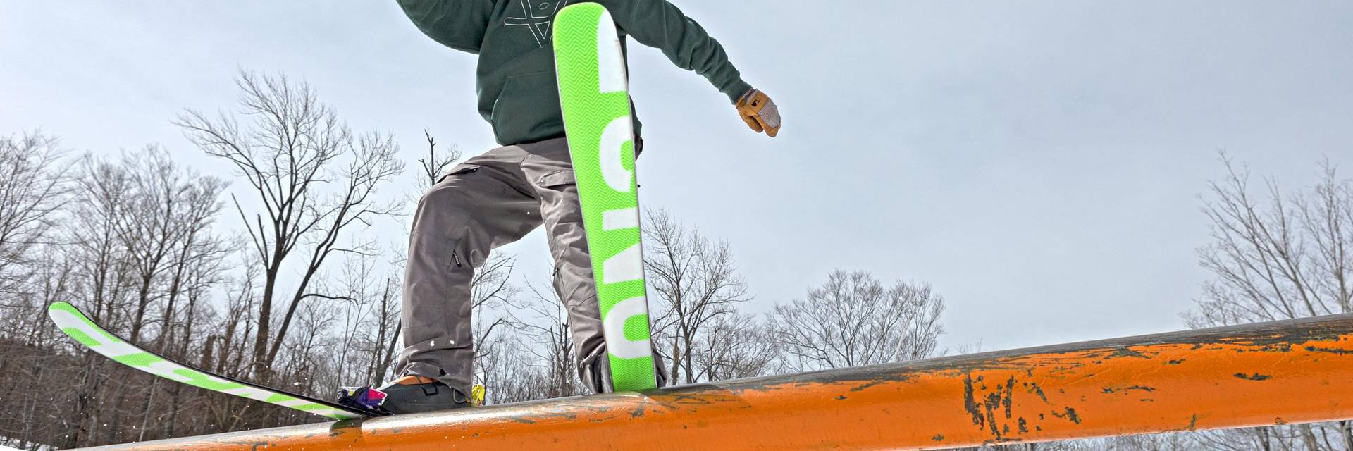 snowboarder riding a flat box