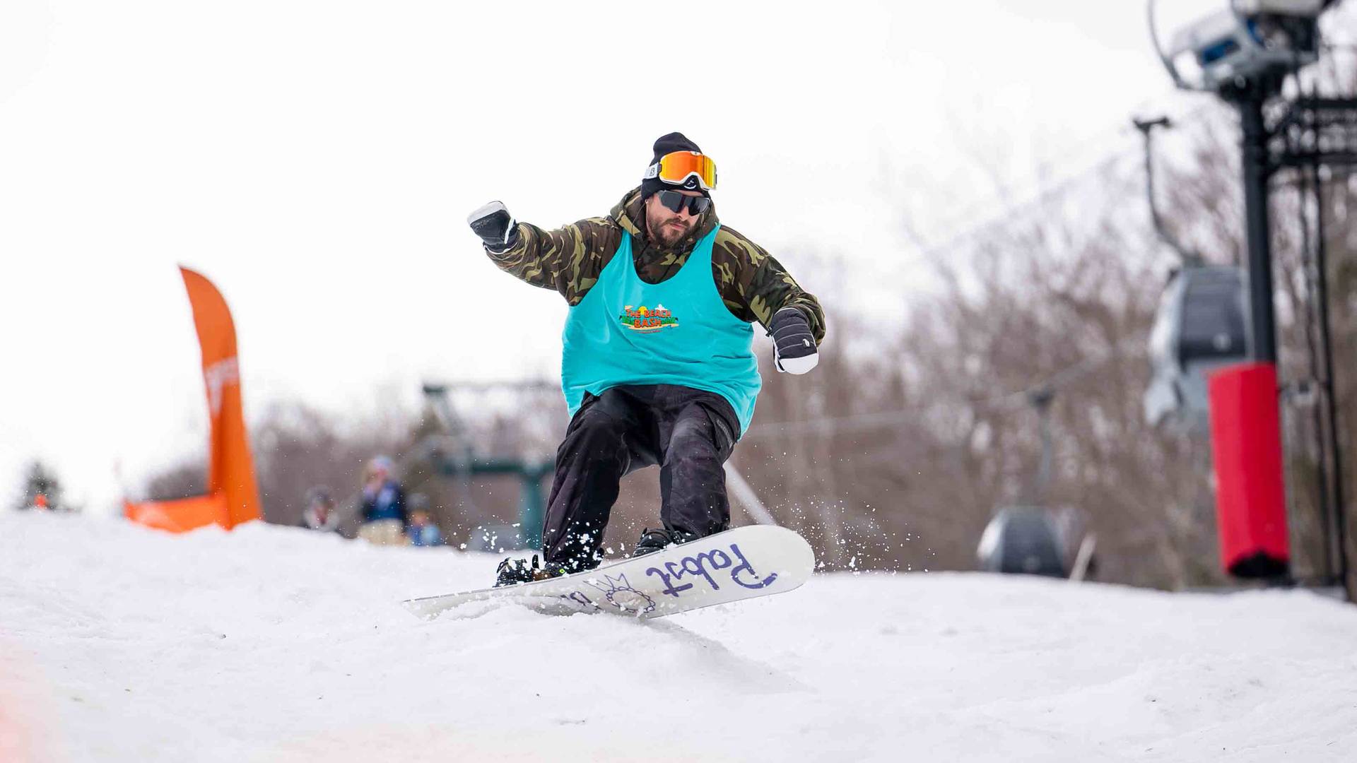 Snowboarder in the Mogul Madness