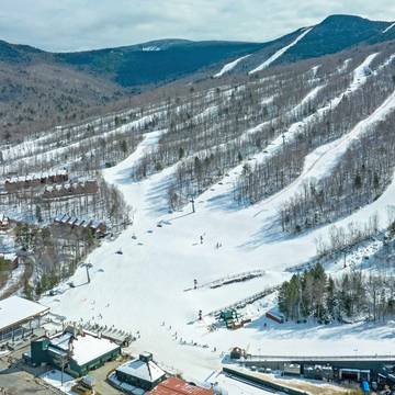 drone shot of Loon Mountain ski trails and base area