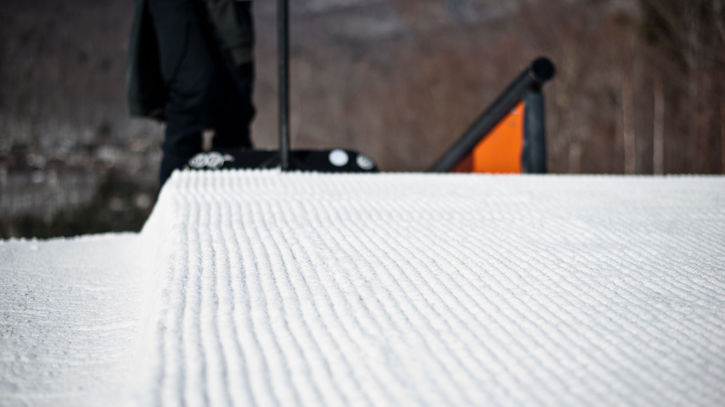 Raking the takeoff of a rail in Loon Mountain Park.