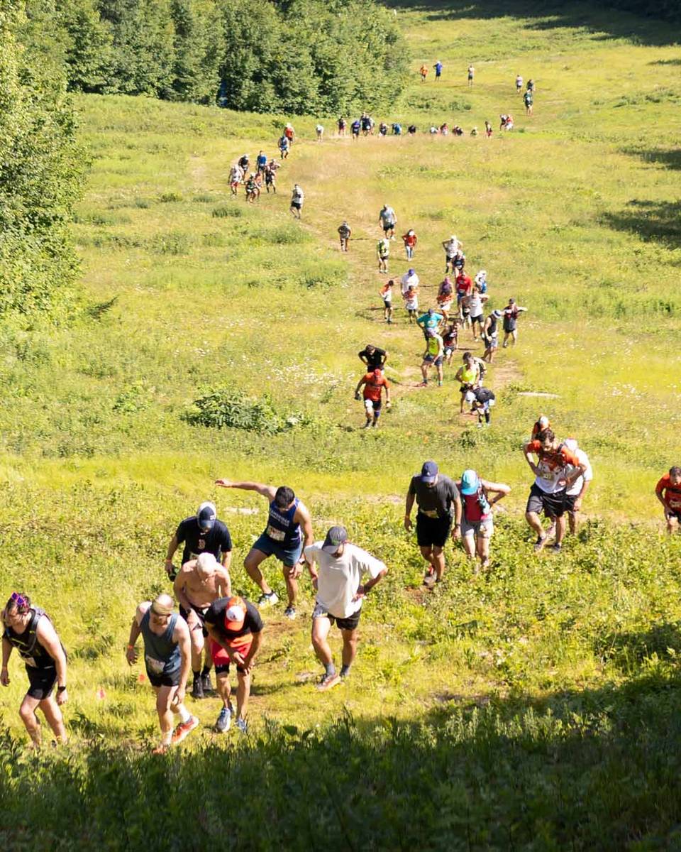 racers going up walking boss in loon mountain race