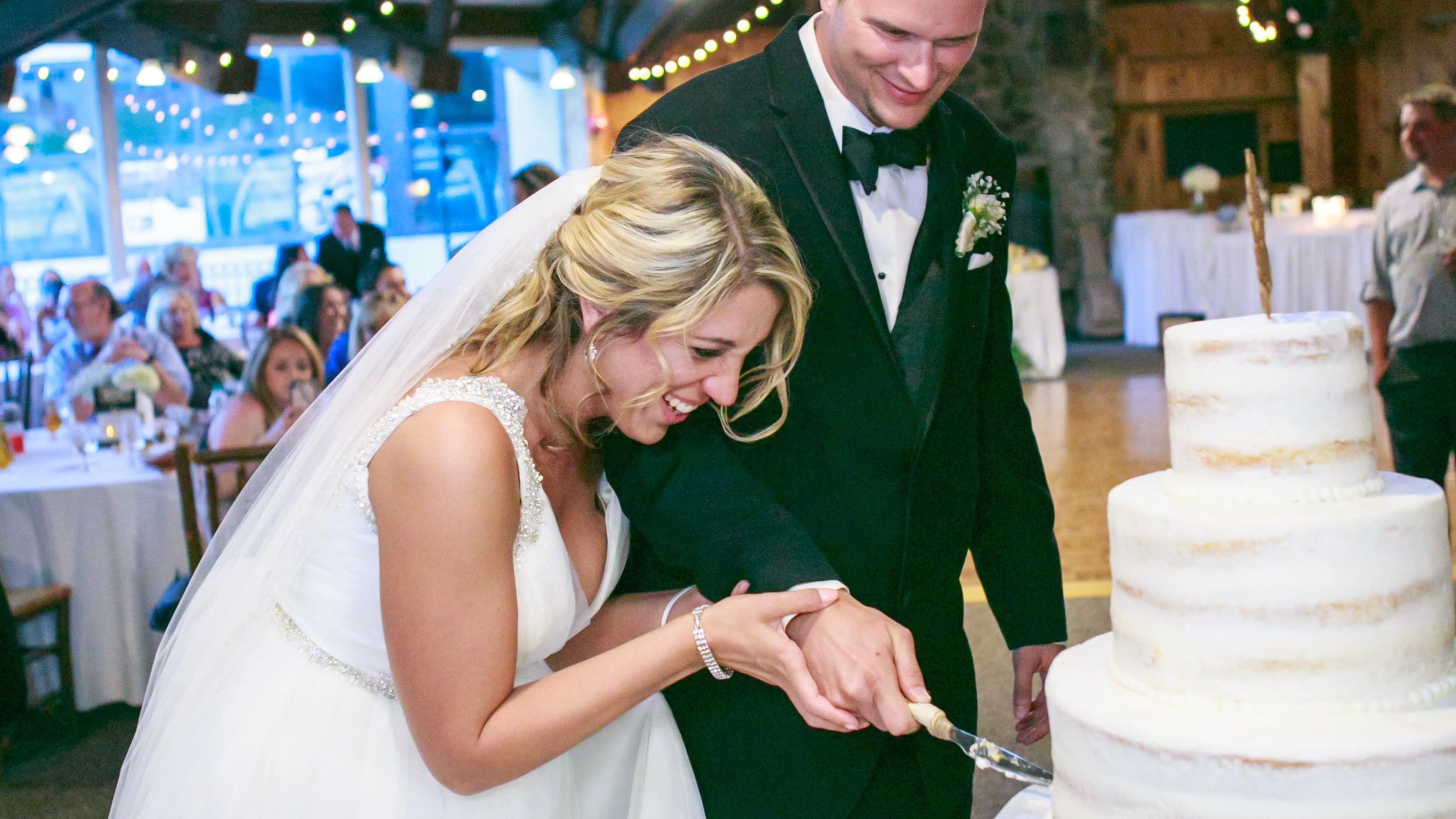 Wedding couple cutting cake