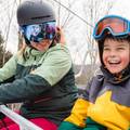 Child and adult on chairlift