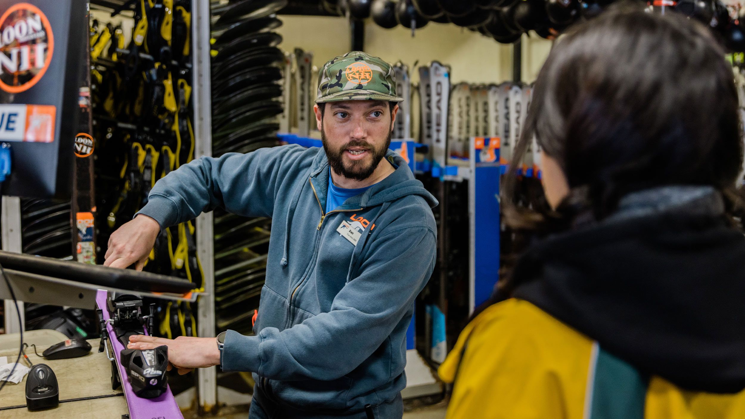 Rental tech assisting a guest