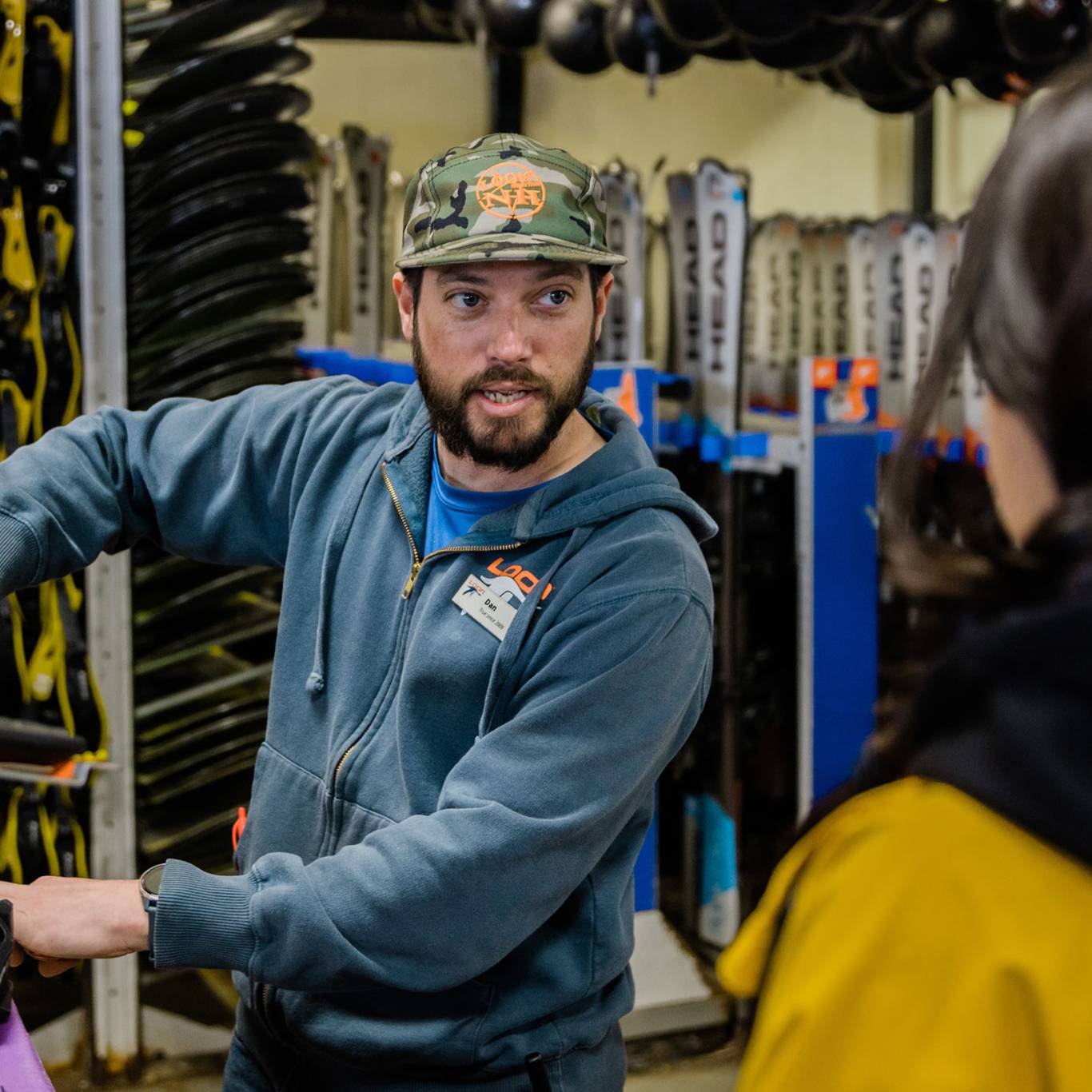 Rental tech assisting a guest