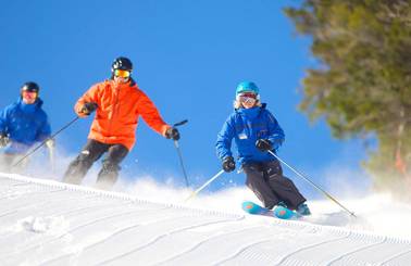 two people in a ski lesson with Loon Mountain ski instructor