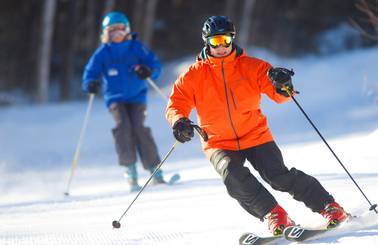 skier and coach in Flying 50s program