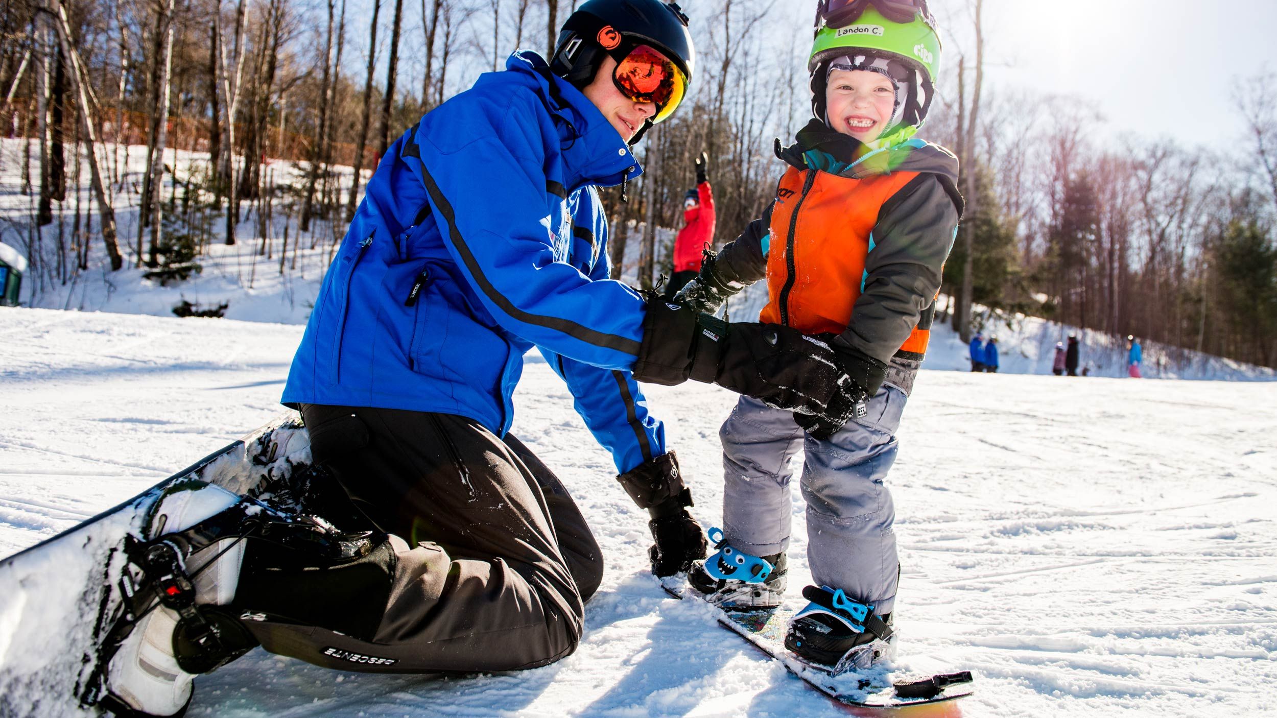 Kids on snowboards