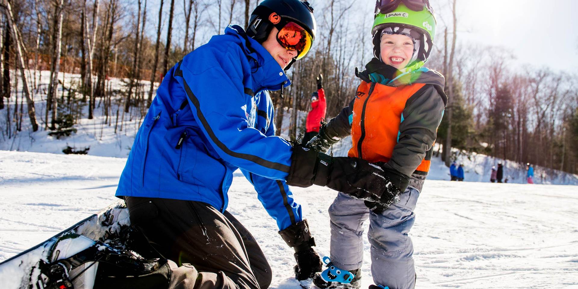 Kids on snowboards
