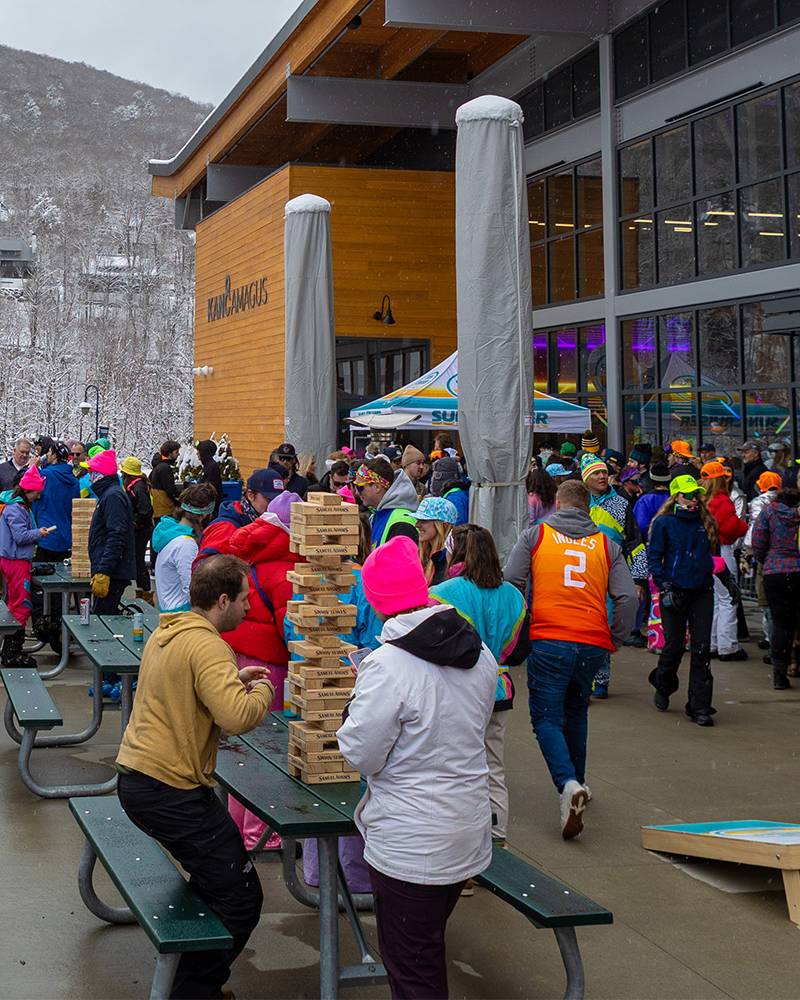 people in '80s day costumes