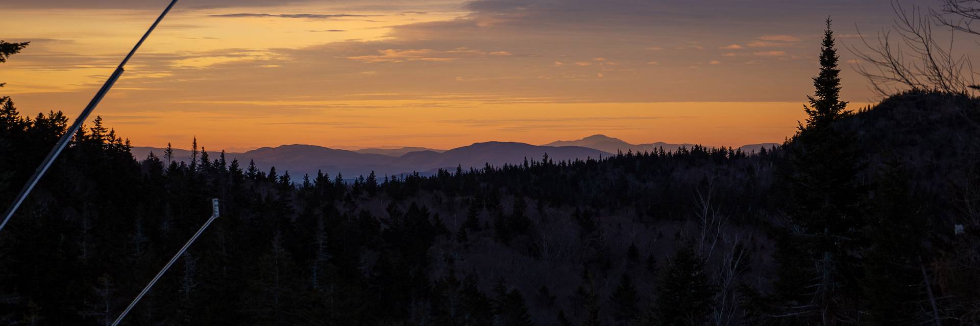 Image of sunrise atop Loon Peak