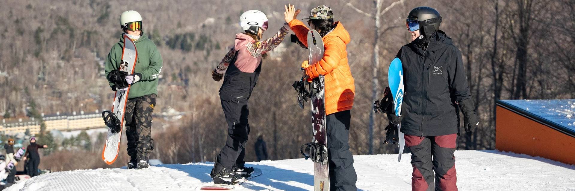 BTB Ride day, snowboarders high fiving